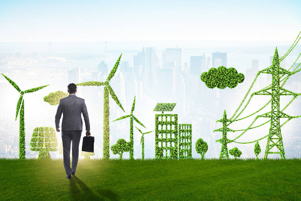 Groen en ecologisch concept met zakenman - Foto, afbeelding