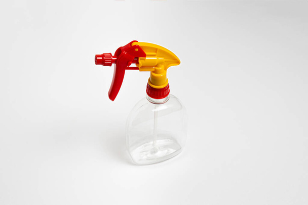 Spray Dispenser Pump Plastic Bottle on white background.Plastic spray gun.Top view.High-resolution photo. - Photo, Image