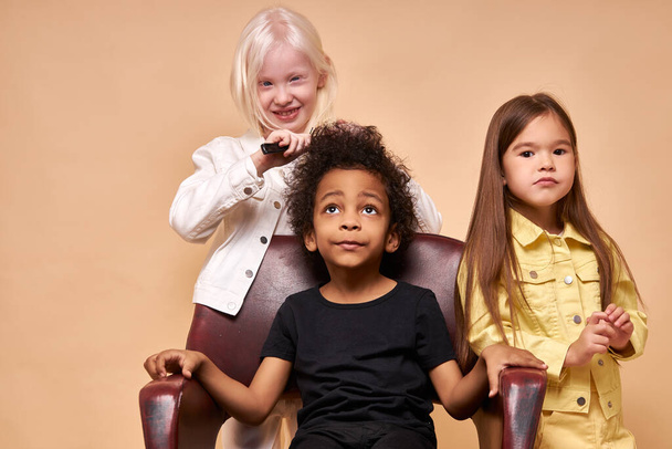friendly diverse kids play hairdressers - Photo, Image