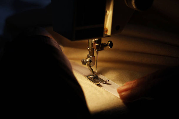 Sewing machine in the night. - Photo, Image