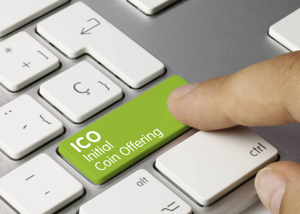 ICO Initial Coin Offering Written on Green Key of Metallic Keyboard Ключ для натискання. - Фото, зображення