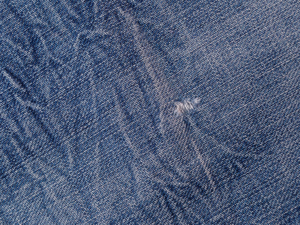 shabby traditionele blauwe denim jeans textuur - Foto, afbeelding
