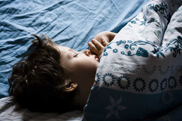 Little boy sleeping in bed - Photo, Image