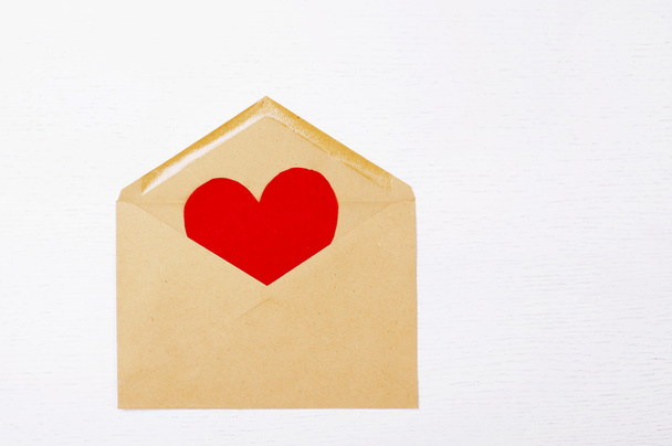 open envelope with paper heart inside - Foto, Bild