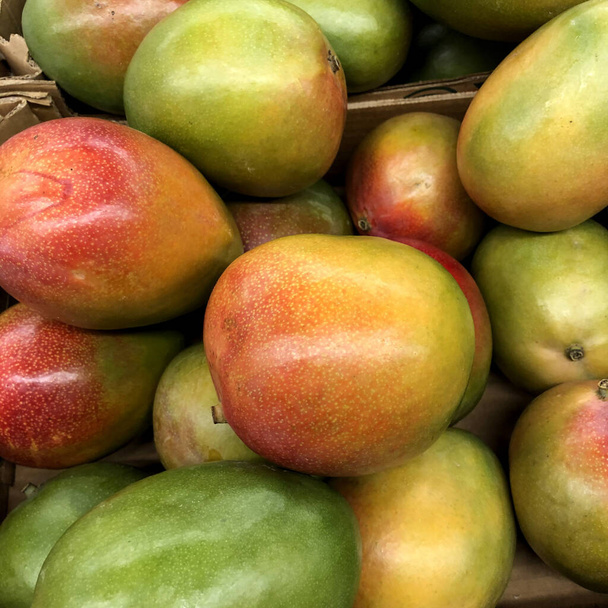 Macro photo mango fruit. Stock photo tropical fruits mango's - Foto, Imagem
