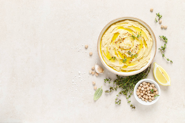 Hummus, mashed chickpeas with lemon, spices and herbs - Фото, зображення
