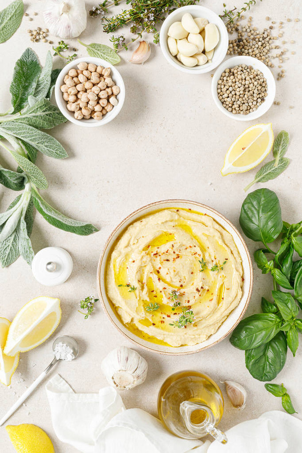 Hummus, mashed chickpeas with lemon, spices and herbs - Fotoğraf, Görsel