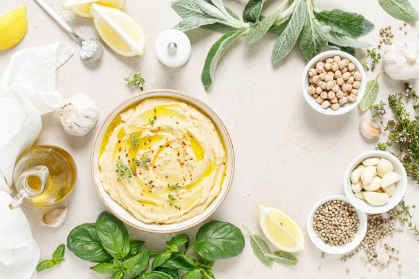 Hummus, mashed chickpeas with lemon, spices and herbs - Foto, immagini