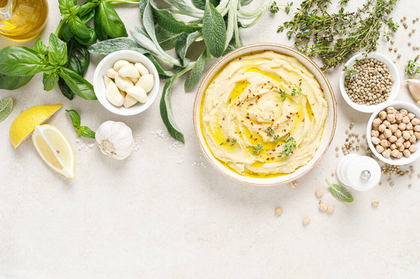 Hummus, mashed chickpeas with lemon, spices and herbs - Fotoğraf, Görsel