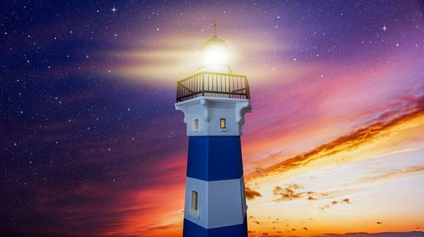 Lighthouse against the background of the sunset landscape. Reference point in maritime navigation - Photo, Image