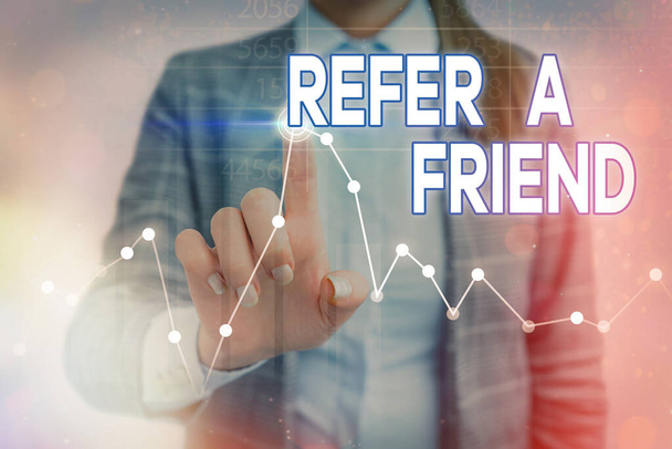 Conceptual hand writing showing Refer A Friend. Business photo showcasing direct someone to another or send him something like gift. - Photo, Image