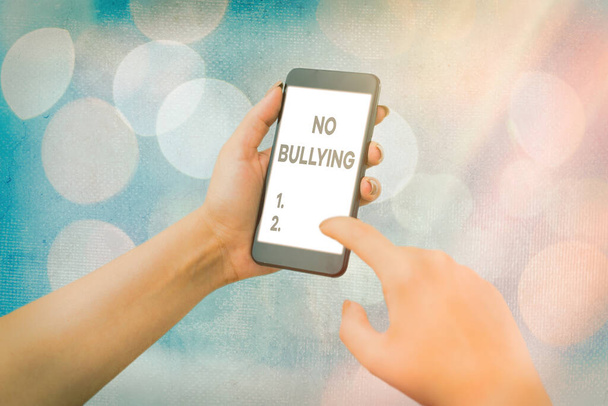 Handwriting text No Bullying. Concept meaning stop aggressive behavior among children power imbalance. - Фото, изображение