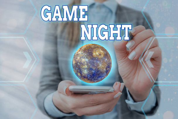 Handwriting text writing Game Night. Concept meaning usually its called on adult play dates like poker with friends Elements of this image furnished by NASA. - Photo, Image