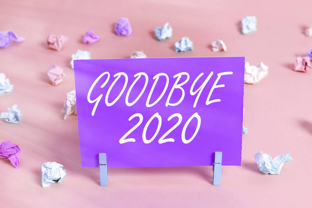 Fogalmi kézírás, amely bemutatja a Good Bye 2020. Üzleti fotó szöveg kifejezni jó kívánságait, amikor elválnak, vagy a végén a tavalyi év. - Fotó, kép