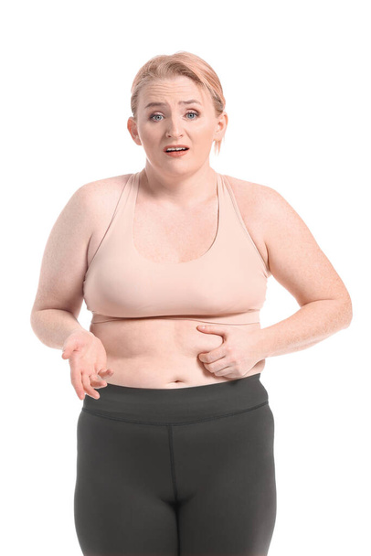 Woman with excess weight on white background - Photo, image