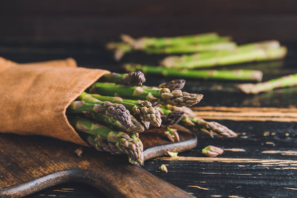 Fresh green asparagus on table, closeup - Foto, afbeelding