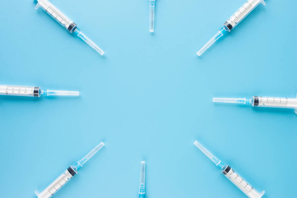 syringes on blue screen background - Photo, Image