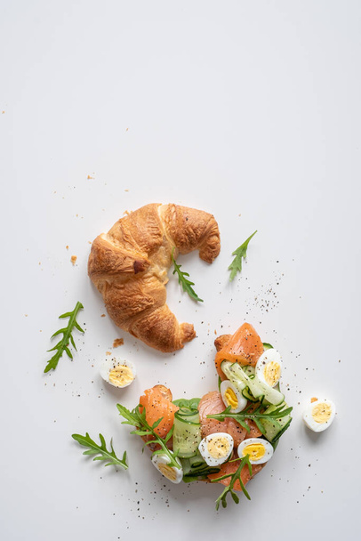 croissant with salted salmon and cucumber - 写真・画像