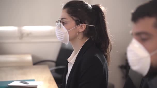Coronavirus Office workers with mask for corona virus. Business workers wear masks to protect and take care of their health. Office working with computer. Working from home.  - Video, Çekim