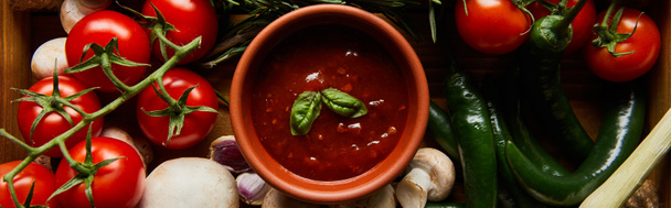 top view of delicious tomato sauce in bowl near fresh ripe vegetables, mushrooms, panoramic shot - Photo, Image