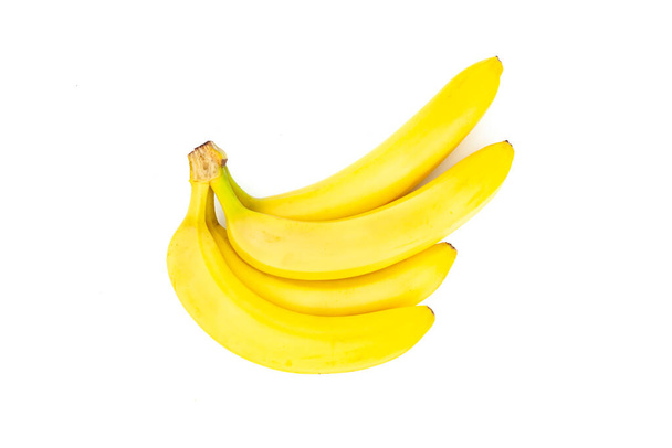 Група бананів ізольована на білому тлі. Творча концепція здорової їжі. Плоский прошарок
. - Фото, зображення