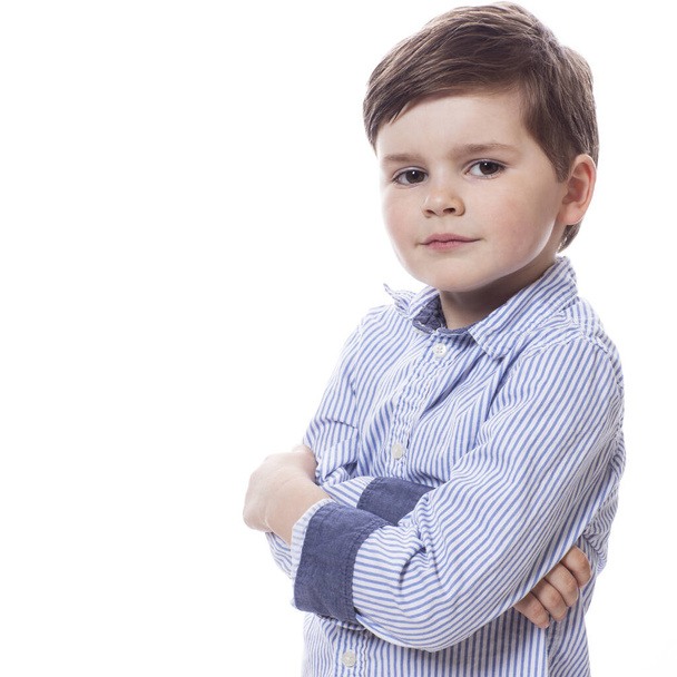 Young cute happy little boy posing on white background.  - Foto, Imagem