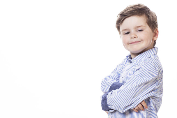 Young cute happy little boy posing on white background.  - Foto, Imagem