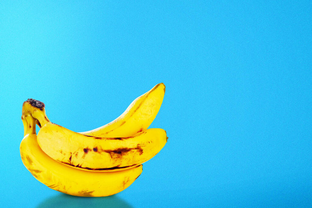 Banana on vivid blue background - Photo, image