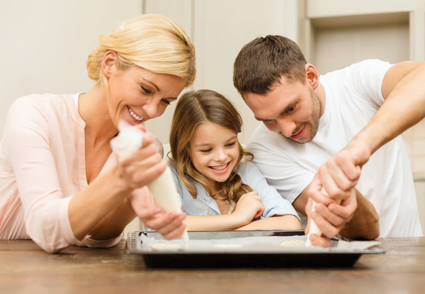 Happy family in making cookies at home - Foto, Imagem