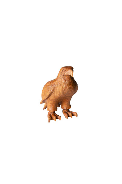 Figurinha de pássaro de madeira isolada em um fundo branco
 - Foto, Imagem