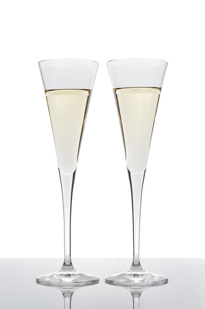 Two glasses of champagne isolated on white. - Fotografie, Obrázek