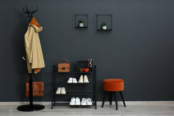 Hallway interior with stylish furniture, clothes and accessories - Foto, imagen