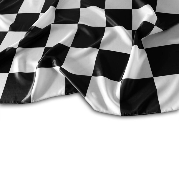 Kockás fekete-fehér zászló fehér háttérrel. Fénymásolási hely - Fotó, kép
