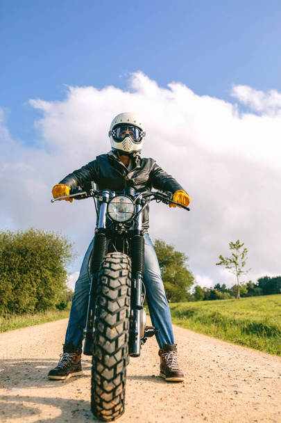 Man with helmet riding custom motorbike - Photo, Image