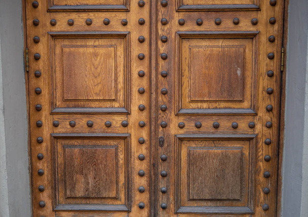 Vintage Background. Elements Of An Old Carved Wooden Door  - Fotó, kép