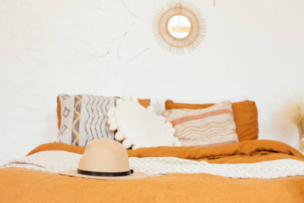 boho rustic scandinavian bedroom interior. cozy minimalistic design ideas - 写真・画像