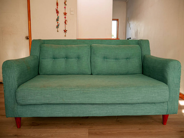 Large sofa in the living room at sunrise - Фото, зображення