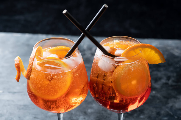 Classic italian aperol spritz cocktail in glass on a dark, close up - Photo, Image