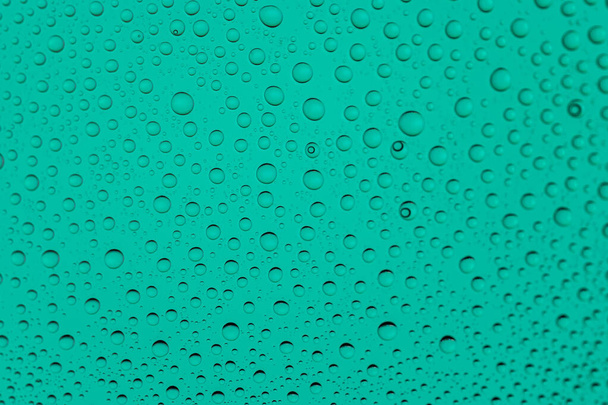 Water drops background. Rain texture on window glass. Wet pattern. - Photo, Image