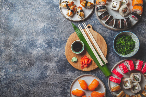 Sushi and rolls sets. Japonese food. top view - Φωτογραφία, εικόνα