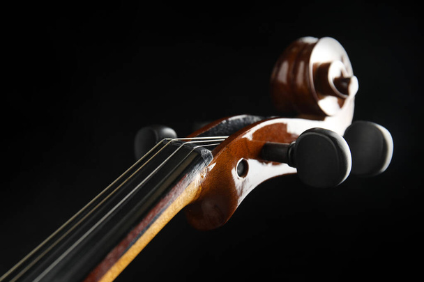 Beautiful violin on black background, closeup view - Фото, изображение