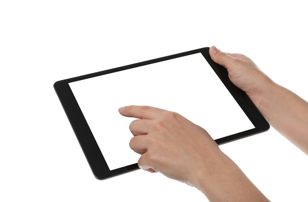Woman using tablet computer with blank screen on white background, closeup. Modern gadget - Foto, Imagem