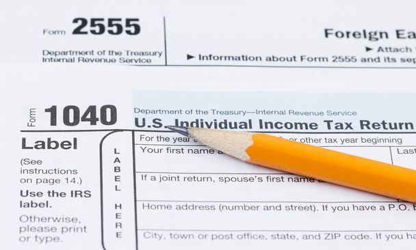 Tax Forms 1040 and 2555 - Photo, Image
