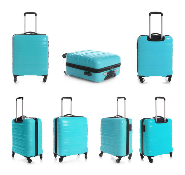 Set of light blue suitcases on white background - Foto, imagen