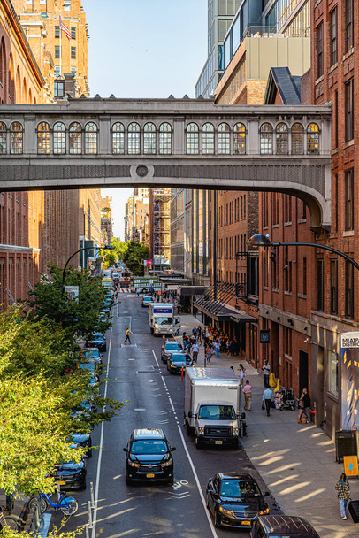 Manhattan, New York, USA - August 29, 2019: High Line Park in Manhattan. View of the surrounding houses and parks. High Line is a popular linear park built on elevated railway tracks. - Photo, Image