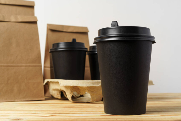Paper bags with take away food and coffee cups containers - Foto, Imagem