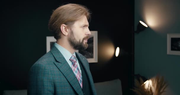 Portrait of businessman posing on camera at office - Záběry, video