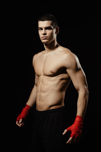 Portrait of male boxer posing - 写真・画像