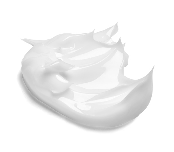 κοντινό πλάνο δείγματος λευκής κρέμας σε λευκό φόντο - Φωτογραφία, εικόνα