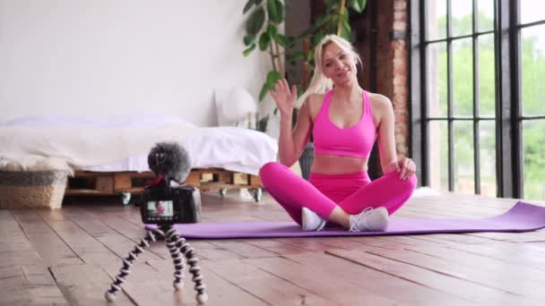 Woman fitness blogger starts online training. - Footage, Video